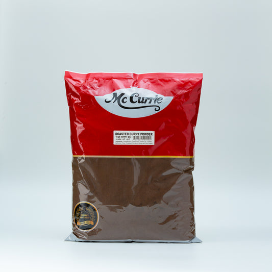 Bag of McCurrie roasted curry powder on a light gray background