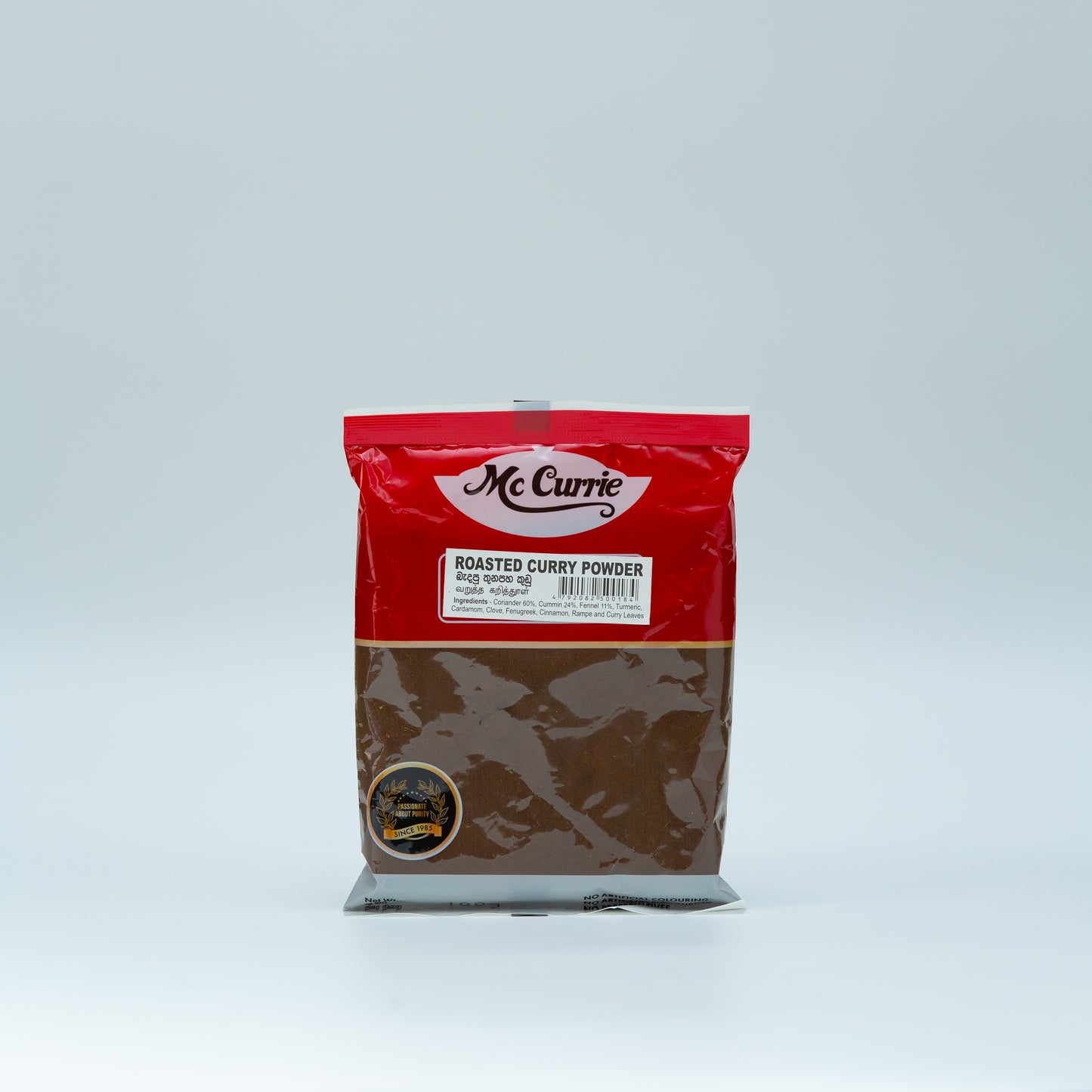 Mc Currie roasted curry powder on a white background