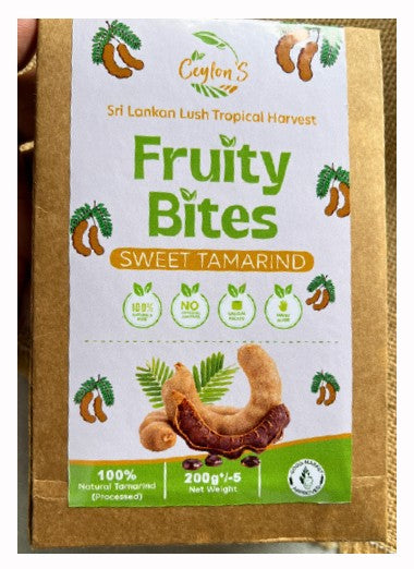 Packaging of Fruity Bites Sweet Tamarind with branding and product details.